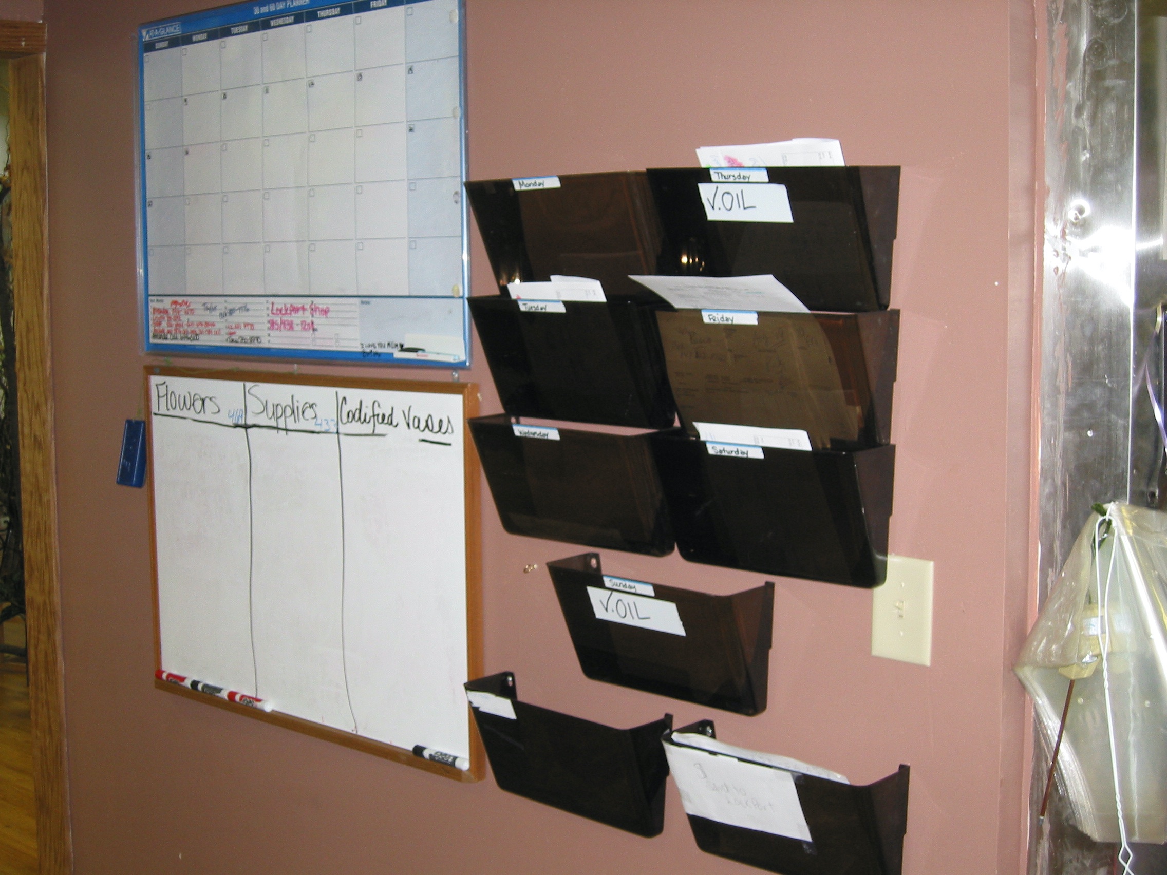 Photo of a makeshift calendar at a florist shop